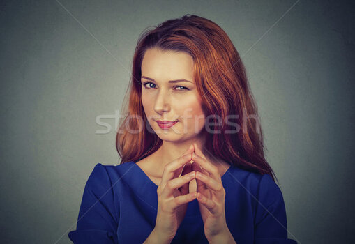 7240837_stock-photo-sneaky-sly-scheming-young-woman-plotting-something.jpg